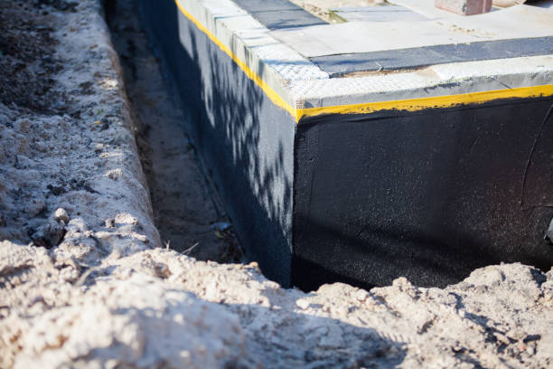Professional Emergency Waterproofing technician working in Ransomville, NY